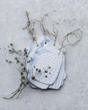 Cheese boards handmade ceramics by clay beehive in rustic blue and white patterned finishes