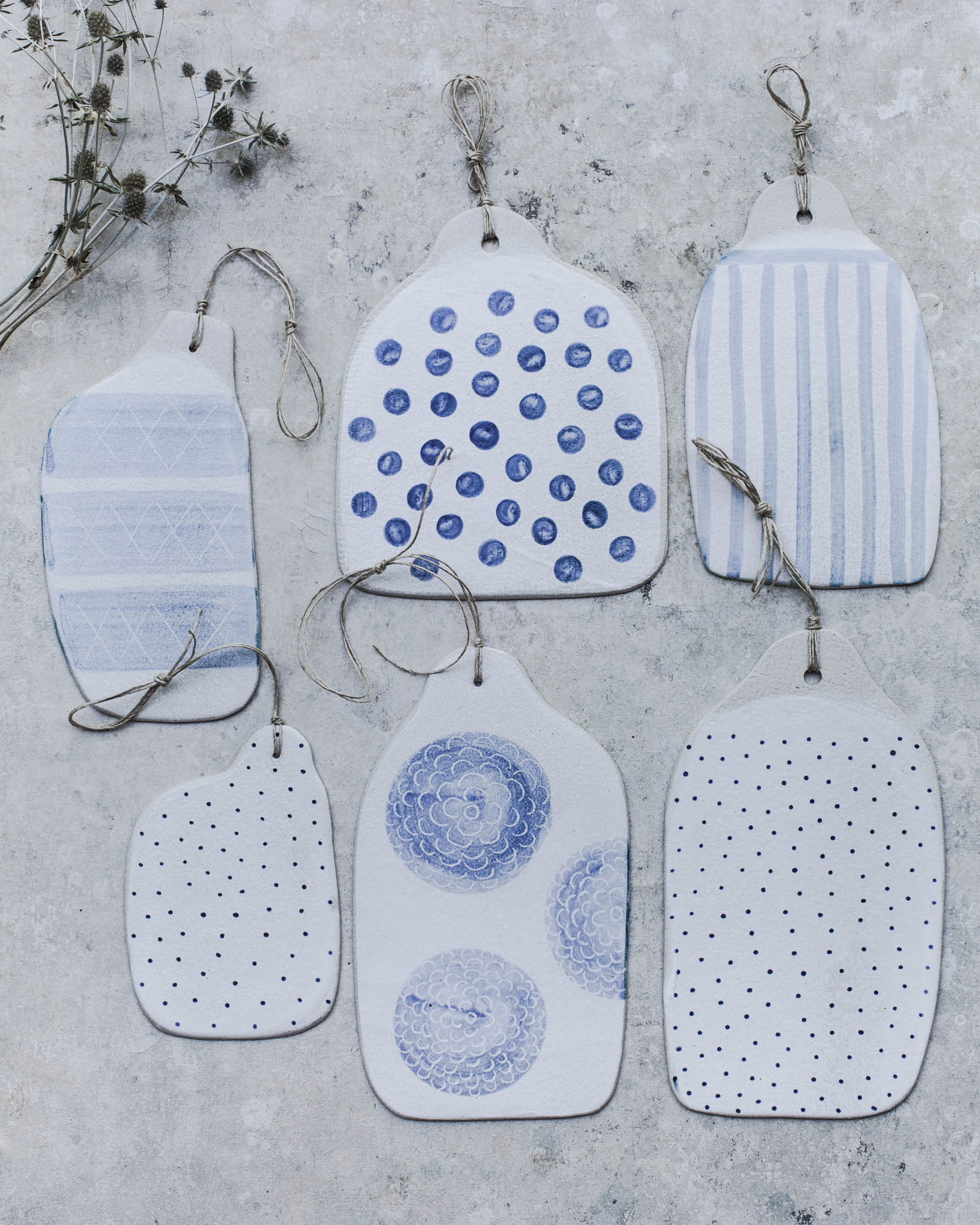 Cheese boards handmade ceramics by clay beehive in rustic blue and white patterned finishes