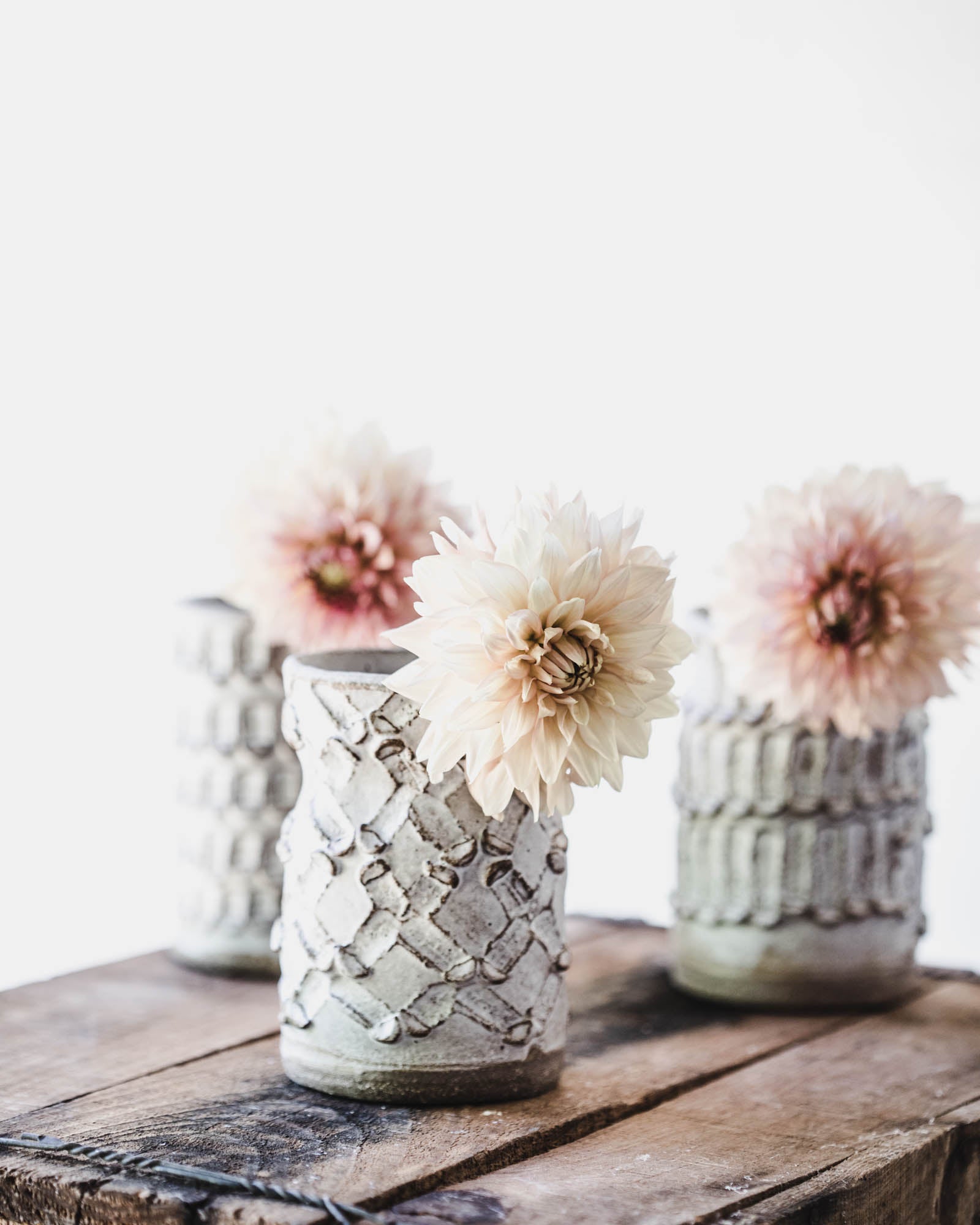 rustic textured vases in white matte finish perfect size for holding posies of handpicked flowers by clay beehive ceramics