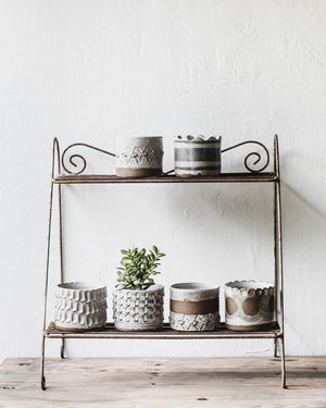 Handmade rustic ceramic planters with textured surfaces by Clay Beehive Ceramics