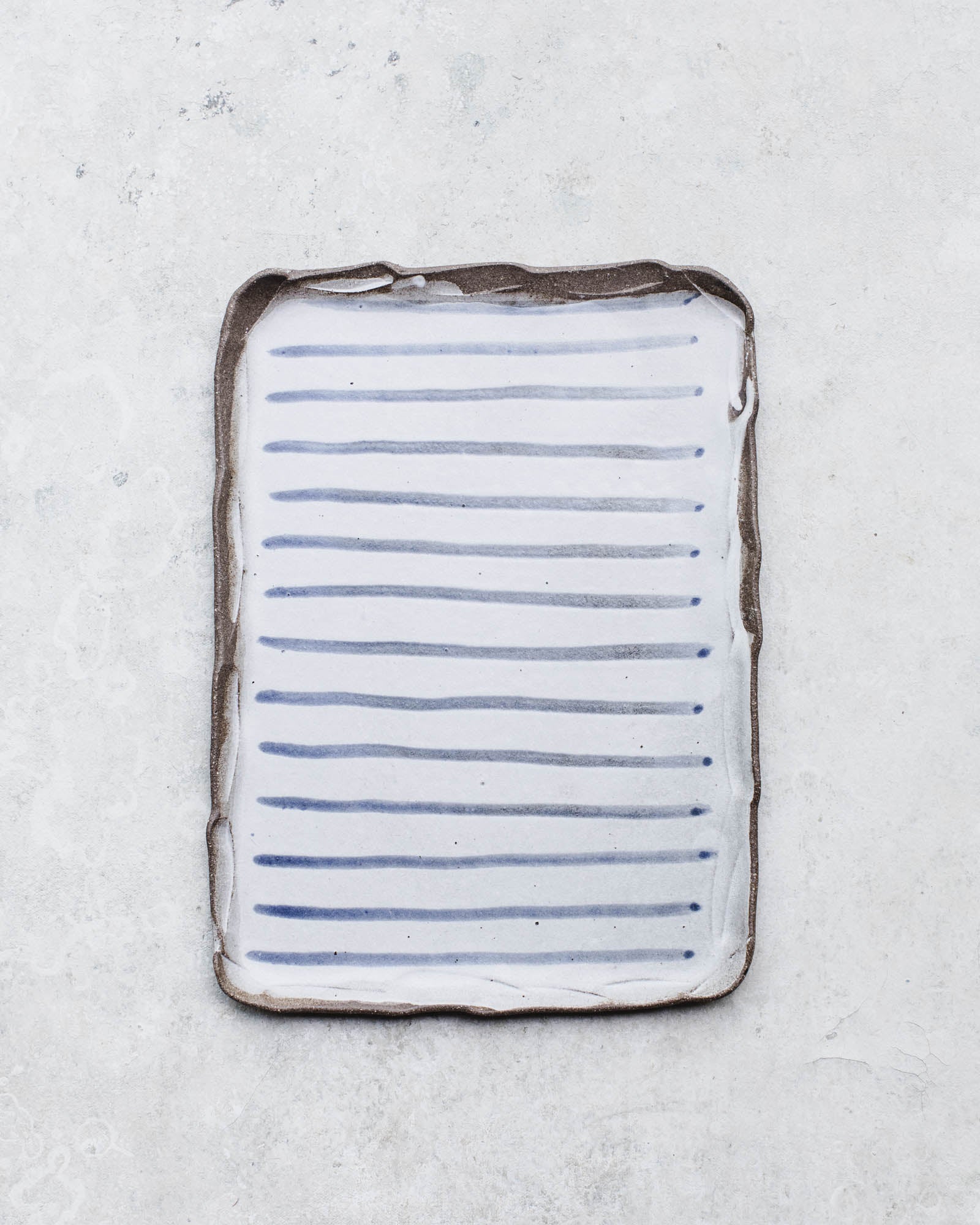 nautical blue lines platter with organic shaped rim and rectangular shape handmade by clay beehive ceramics
