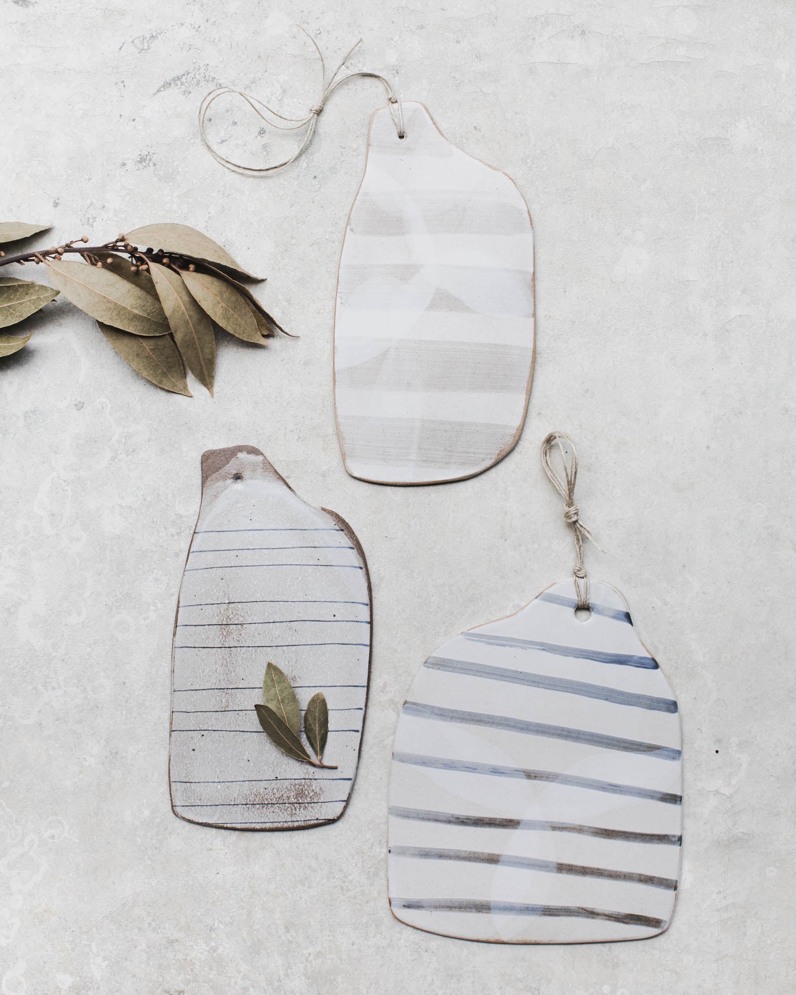 small ceramic handmade cheese board with lines by clay beehive ceramics