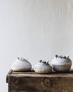 Pod Vases with scalloped rim and carving details