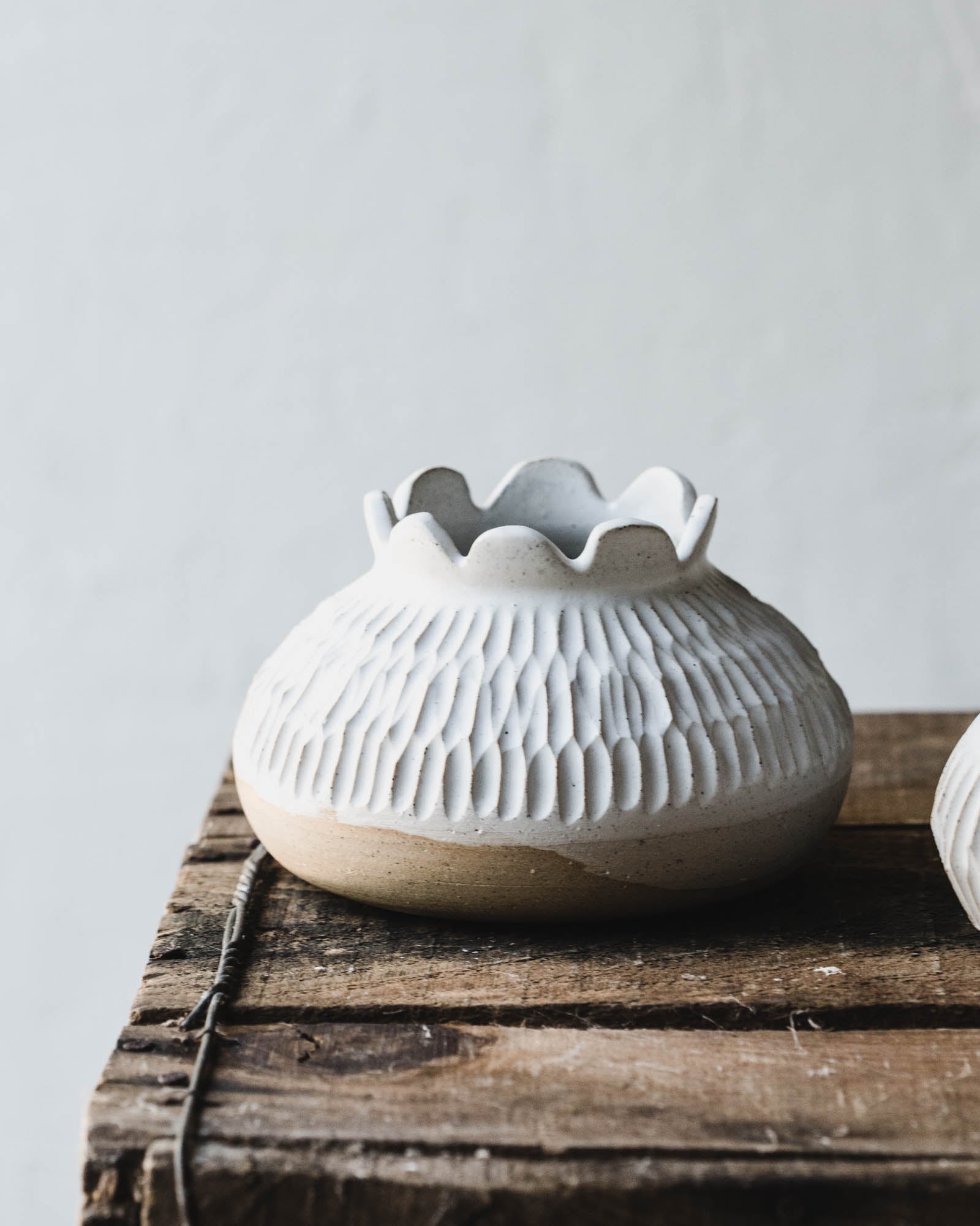 Pod Vases with scalloped rim and carving details