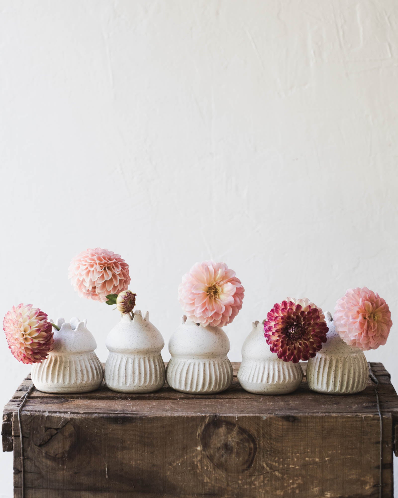 speckled white scalloped rim bud vases handmade on the pottery wheel by clay beehive ceramics