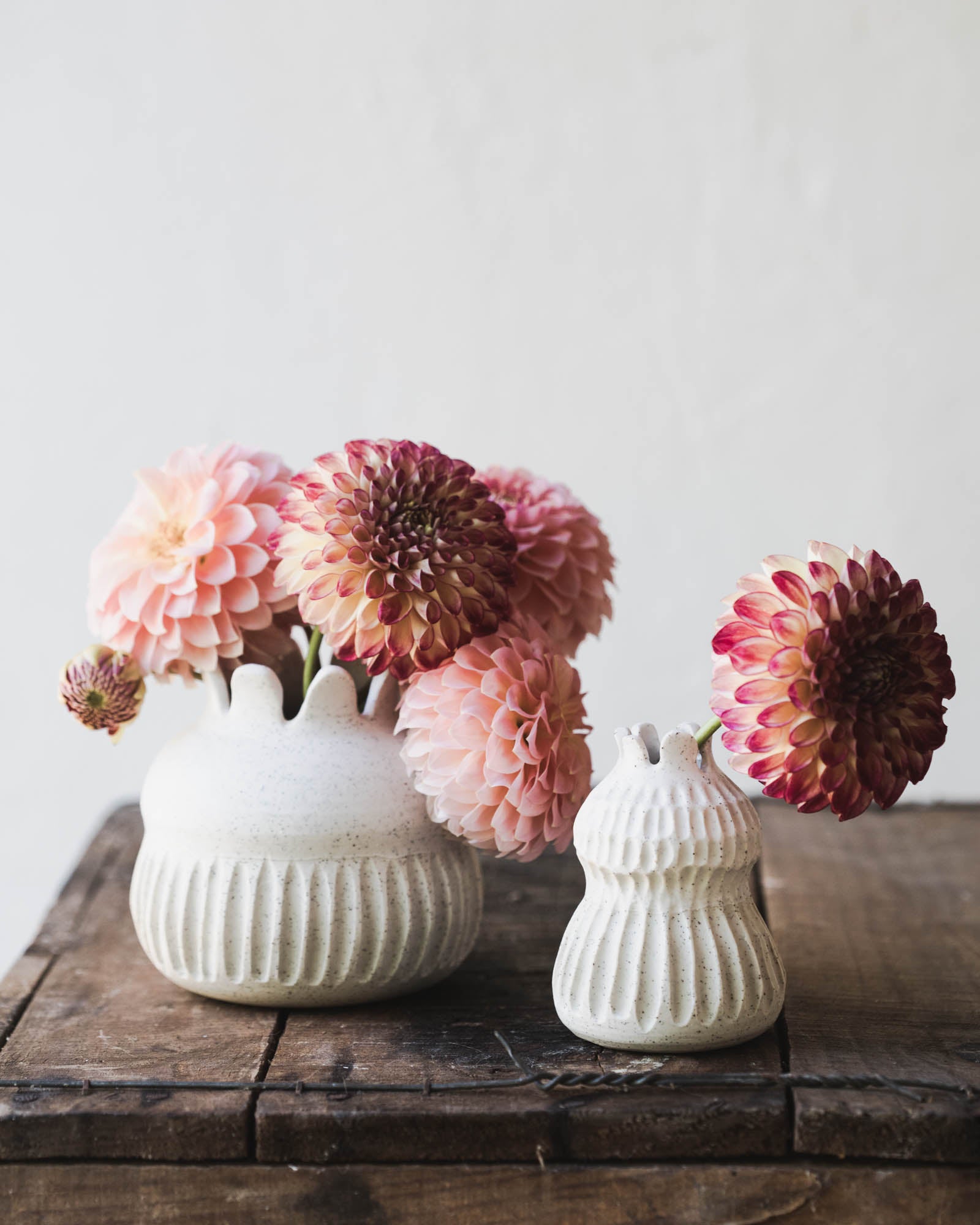 speckled white scalloped rim bud vases handmade on the pottery wheel by clay beehive ceramics