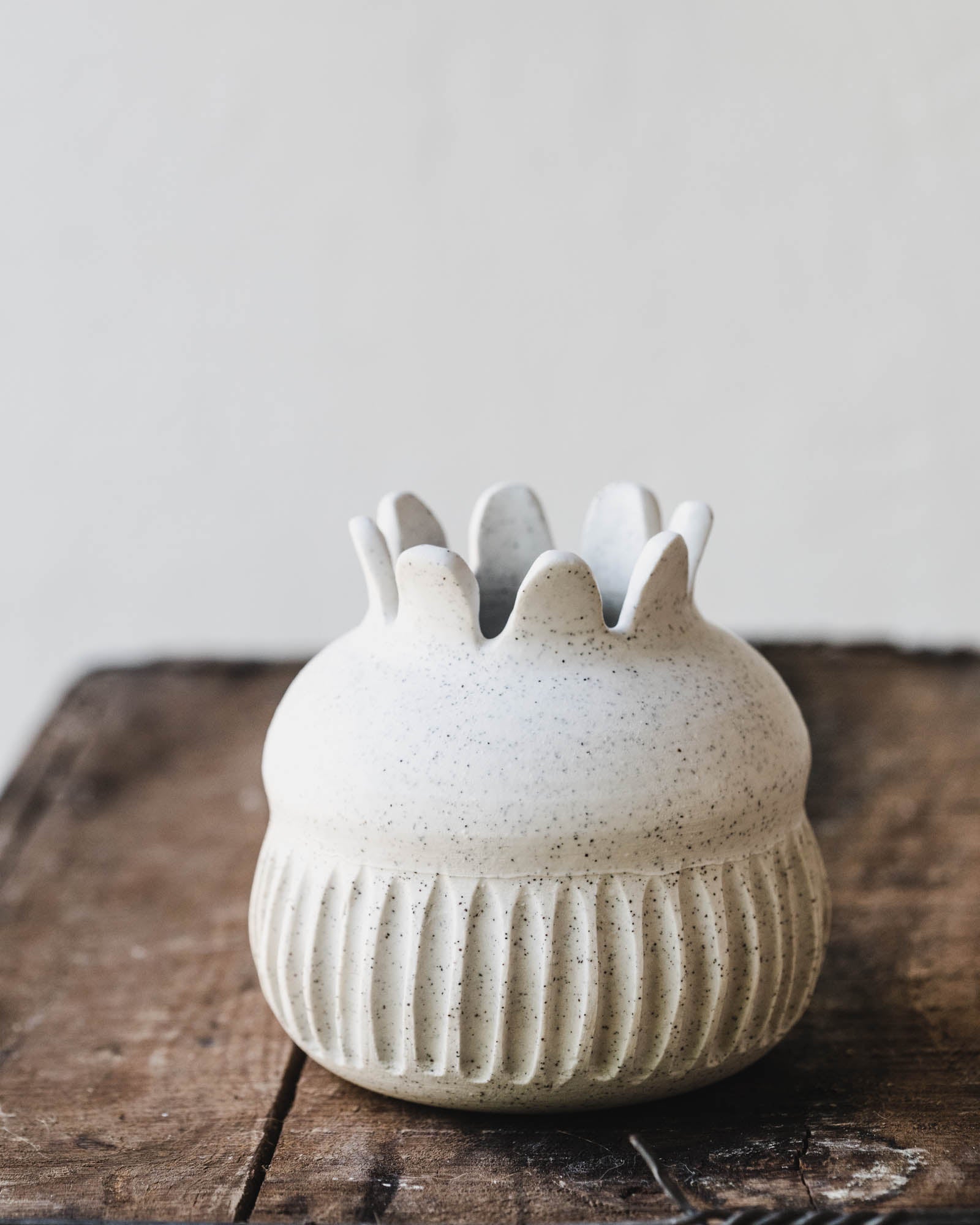 speckled white scalloped rim bud vases handmade on the pottery wheel by clay beehive ceramics