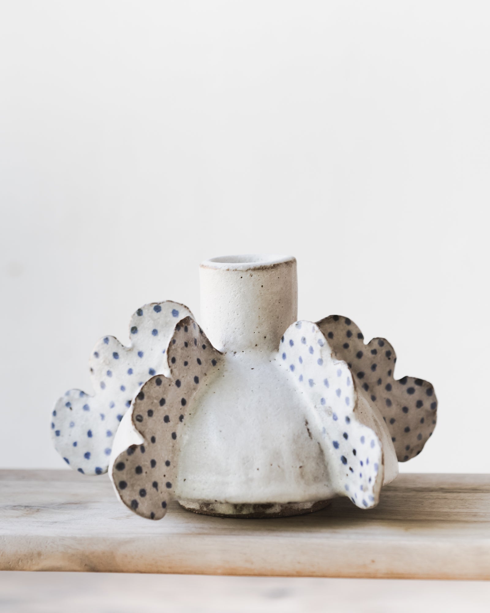 Beautiful sculptural vase with spotted wings by clay beehive ceramics