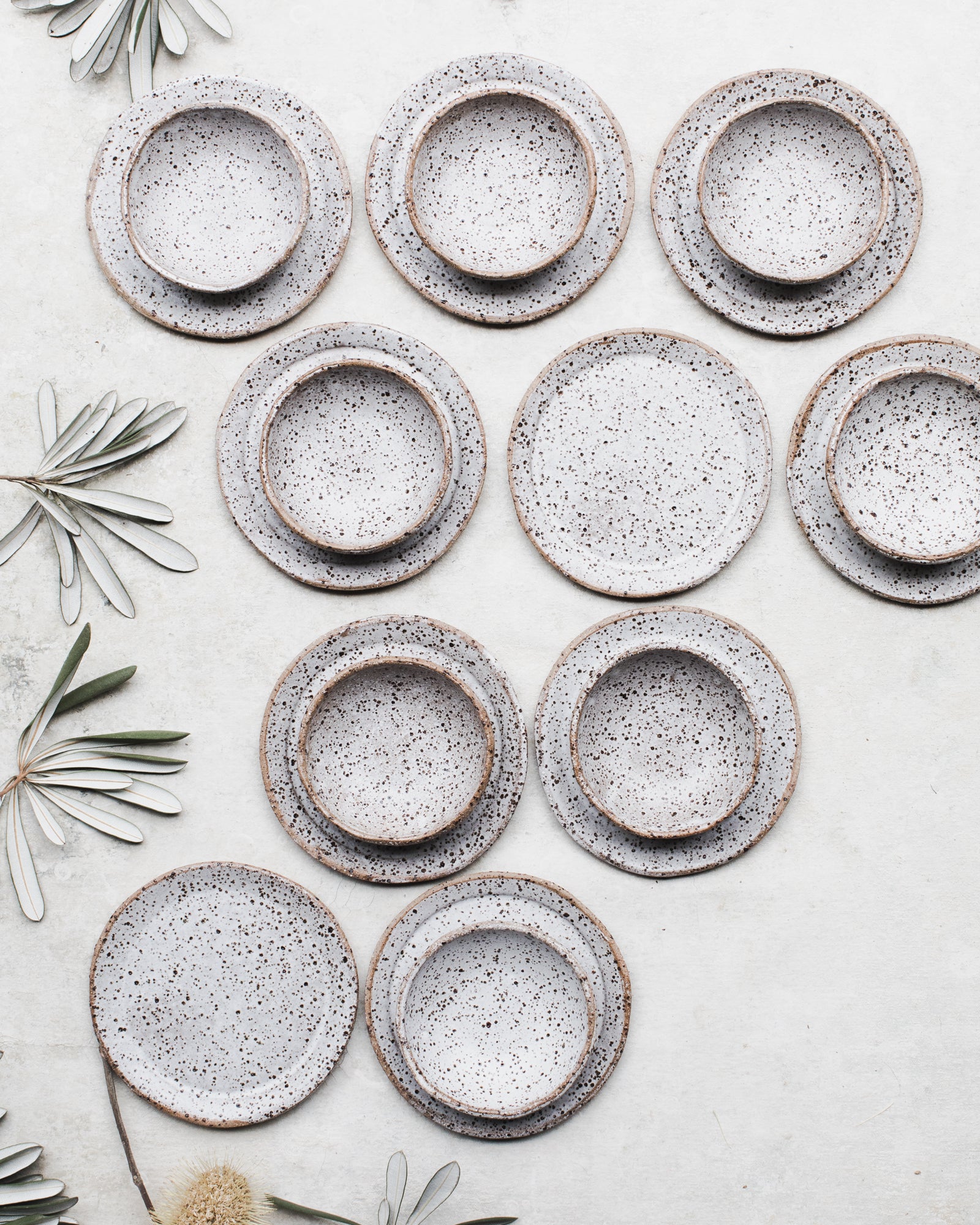 Rustic speckled ceramic bowls and plates sets by clay beehive ceramics