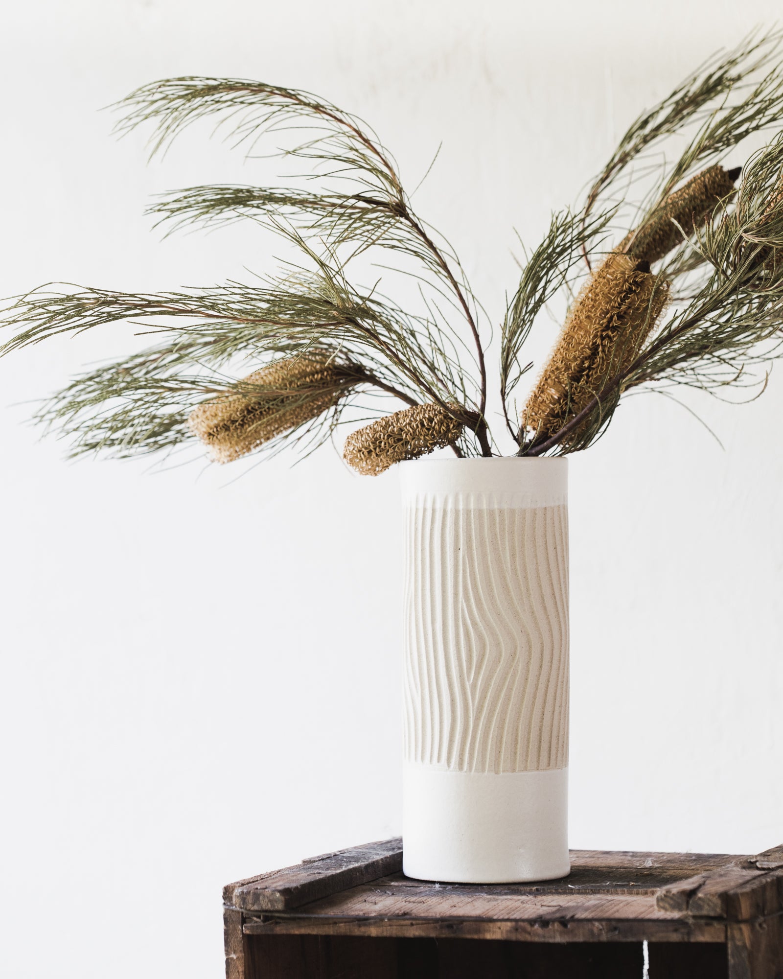 Hand-made tall cylindrical vase with carvings by clay beehive ceramics