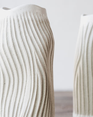 Handmade white sculptural carved vases by clay beehive ceramics