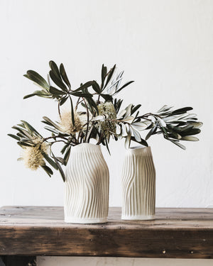 Handmade white sculptural carved vases by clay beehive ceramics