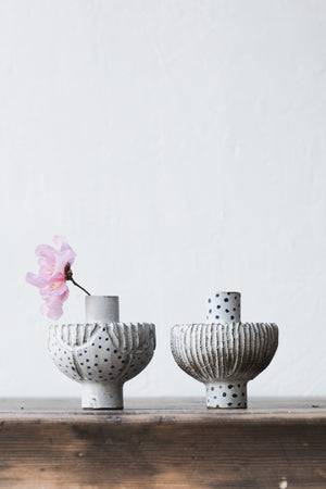 Handmade ceramic flat pod bud vases with carvings and blue freckles by clay beehive ceramics