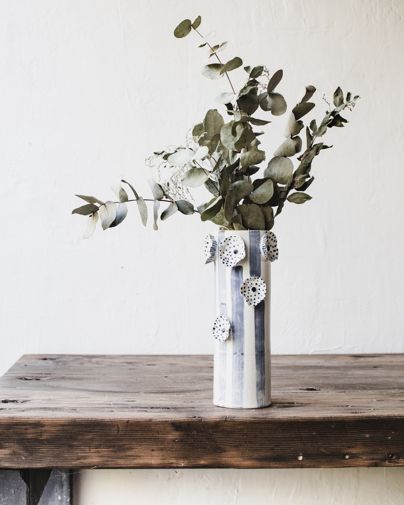 Blue spot flower vase, with vertical blue line decorations by clay beehive ceramics