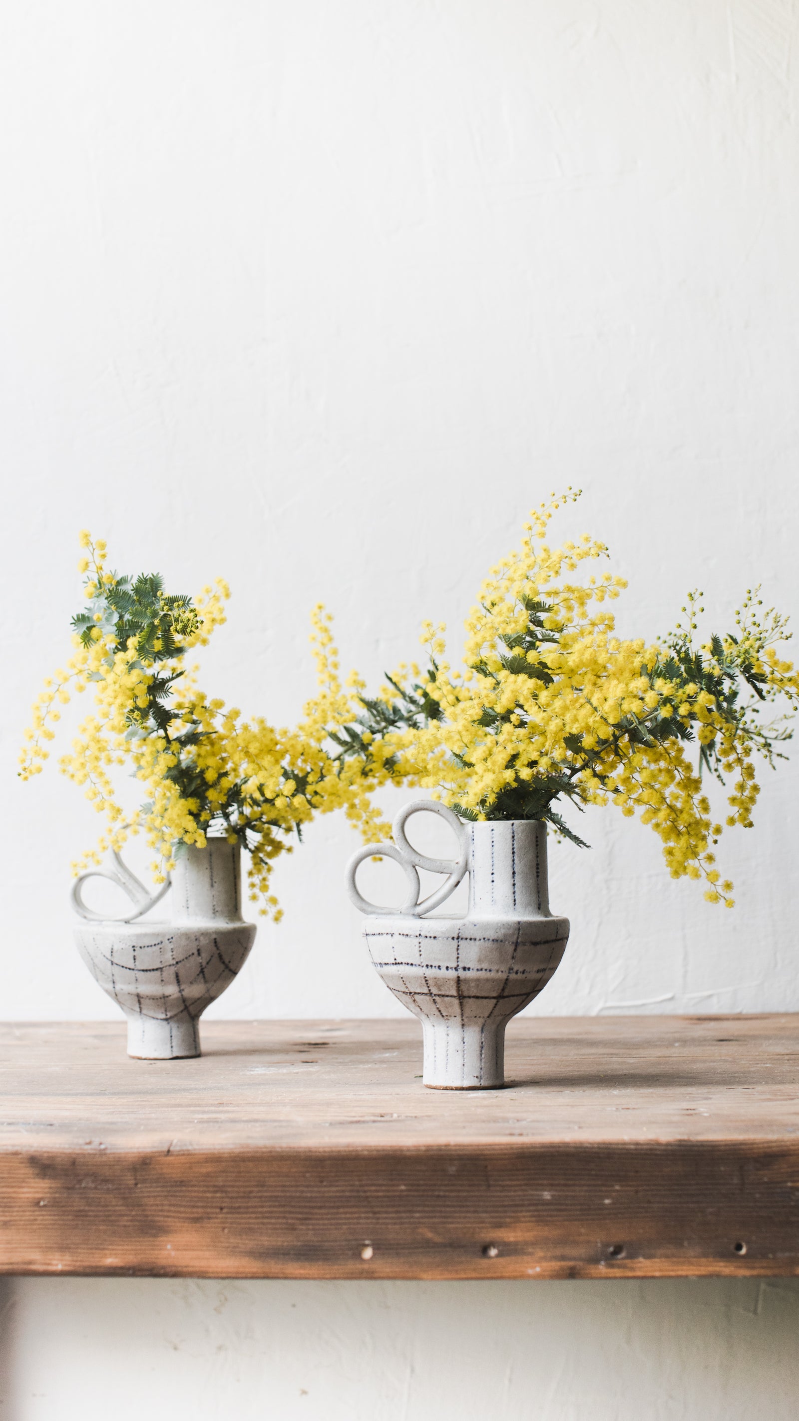 Sculptural swan vases with wings blue and white decorations by clay beehive ceramics