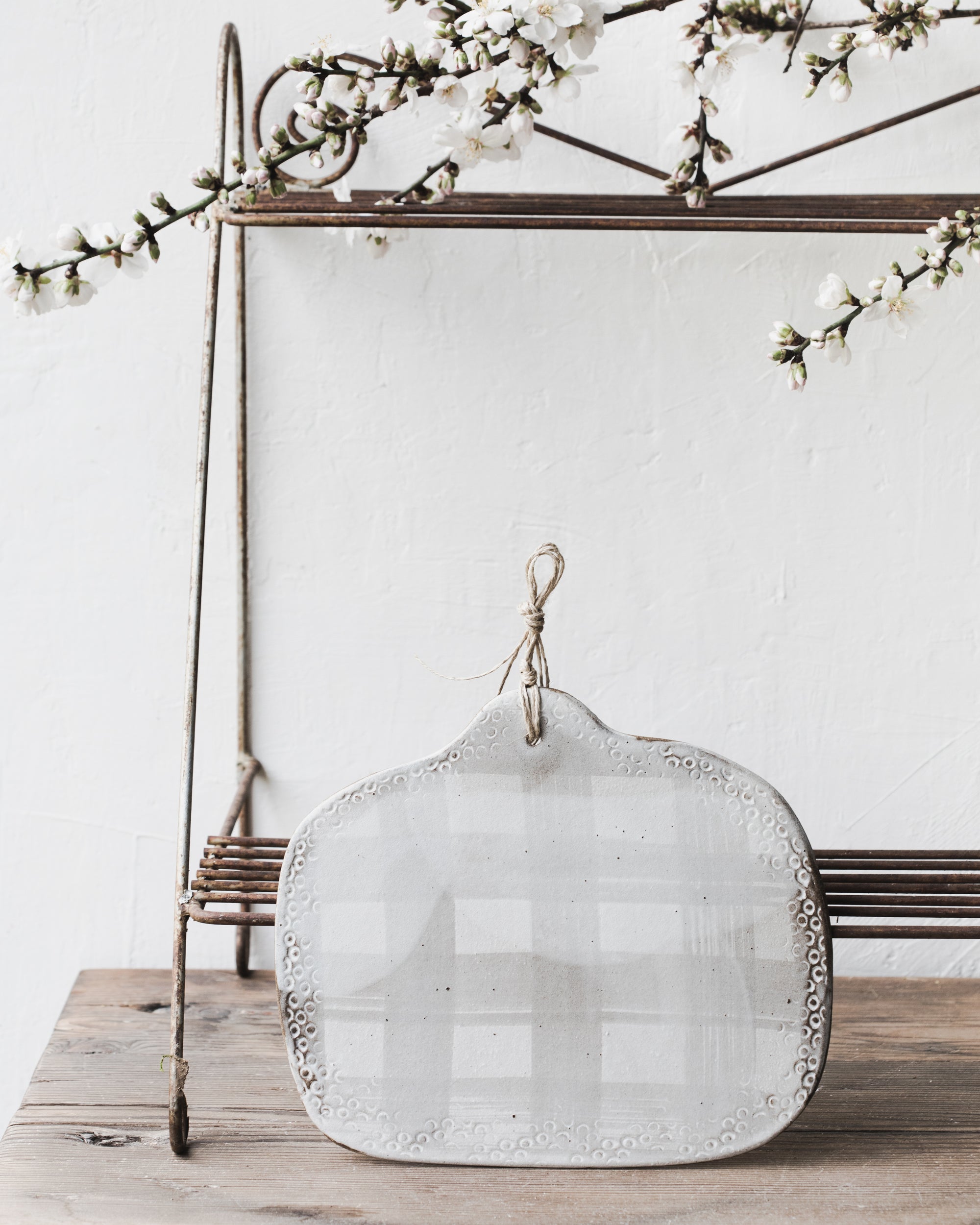 Rustic dark stoneware grid lined platter in grey and white satin with hemp cord handmade by clay beehive ceramics