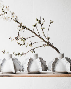 Handmade unique Anjali (angel wing) vases are sculptural and functional holding a single heavier branch stem by clay beehive ceramics