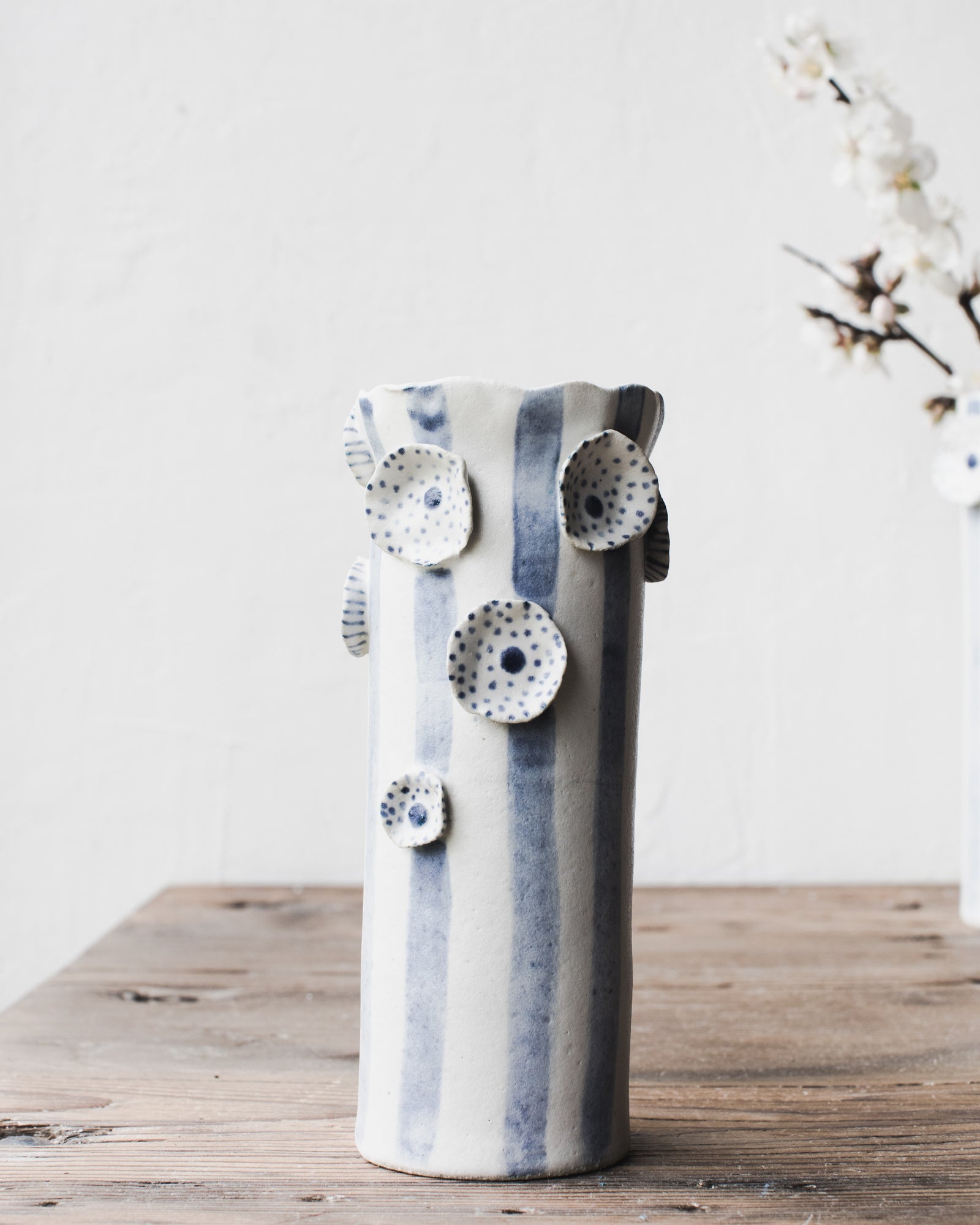 Blue and white flowers and lines tall vases handmade by clay beehive ceramics