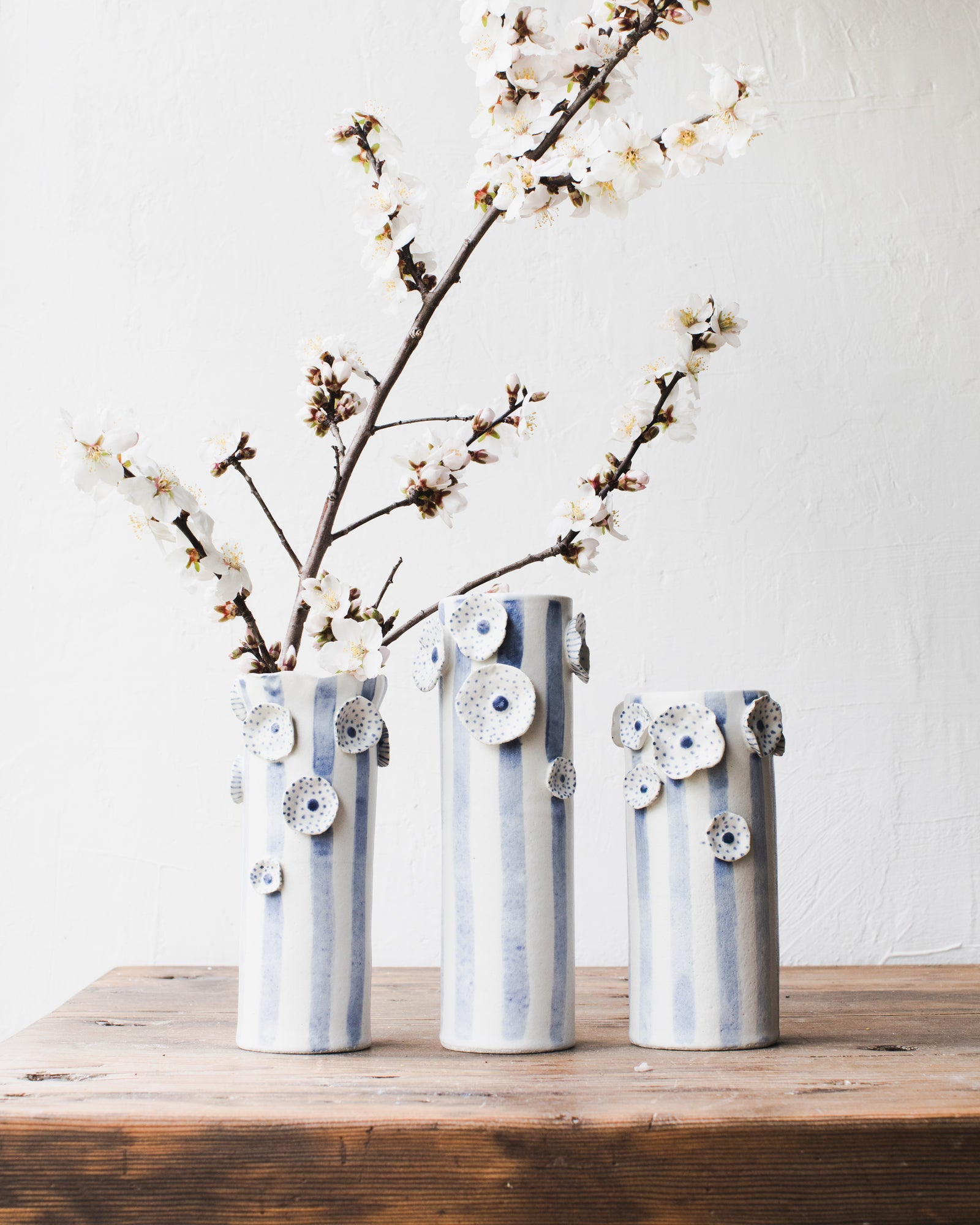 Blue and white flowers and lines tall vases handmade by clay beehive ceramics
