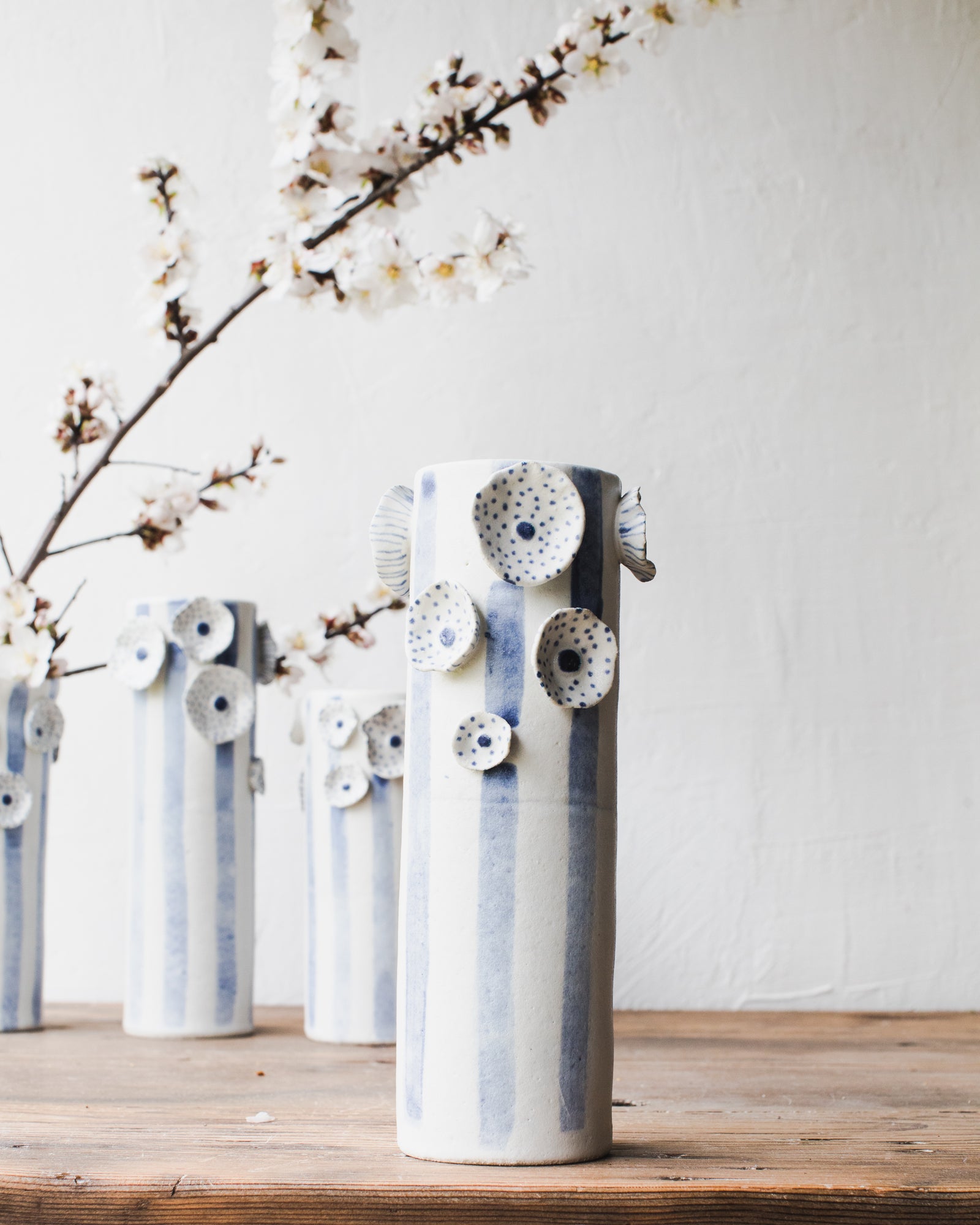 Large tall flower and lines vase by clay beehive ceramics