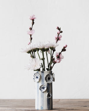 Flower and lines vase in blue and white designed by clay beehive ceramics