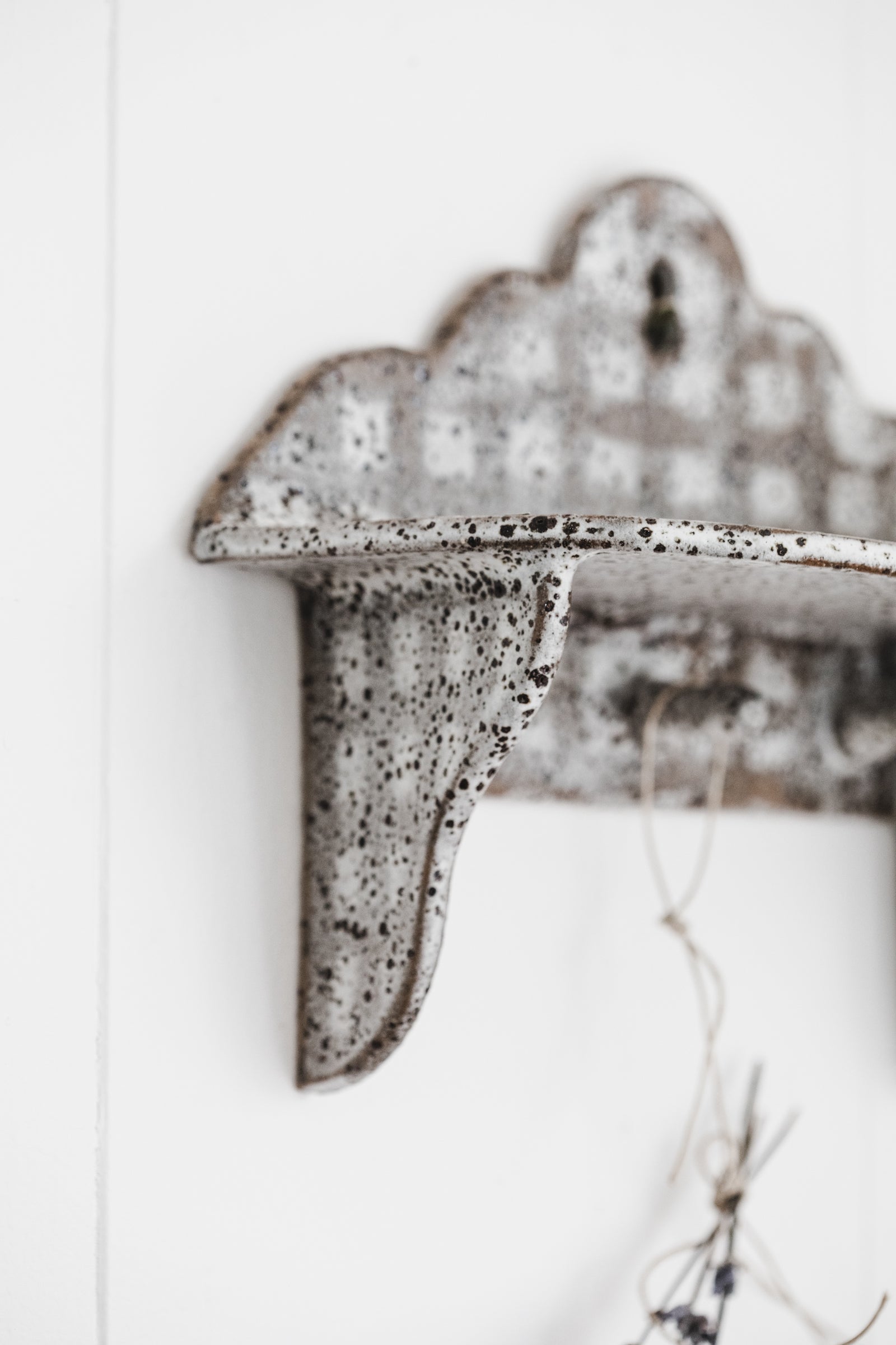 Rustic handmade wall shelf with scalloped rim details and little hangers by clay beehive ceramics