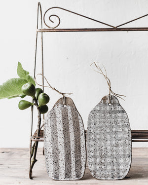 Rustic speckled patterned cheeseboards with hemp cord handmade by clay beehive ceramics