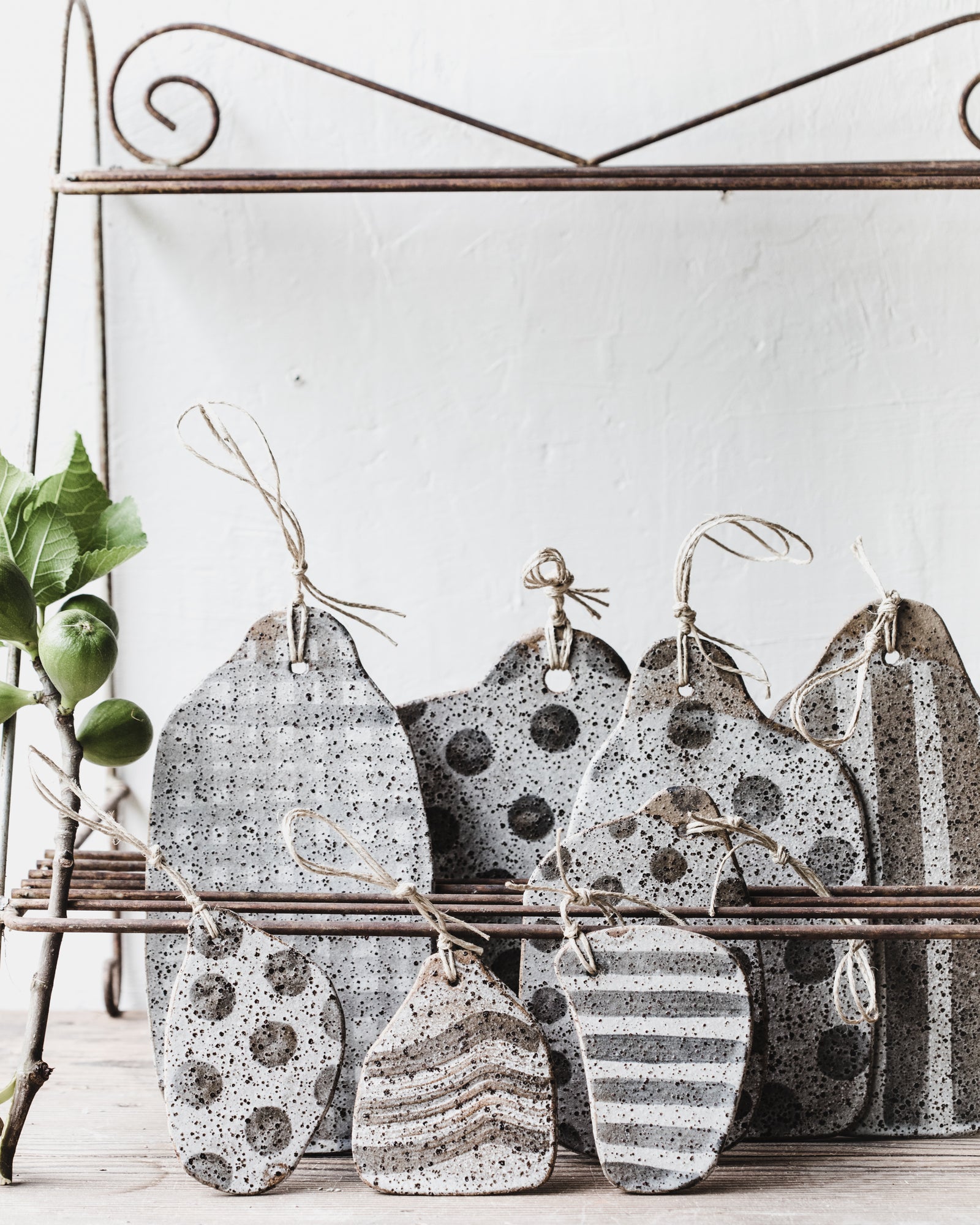 Rustic speckled patterned cheeseboards with hemp cord handmade by clay beehive ceramics