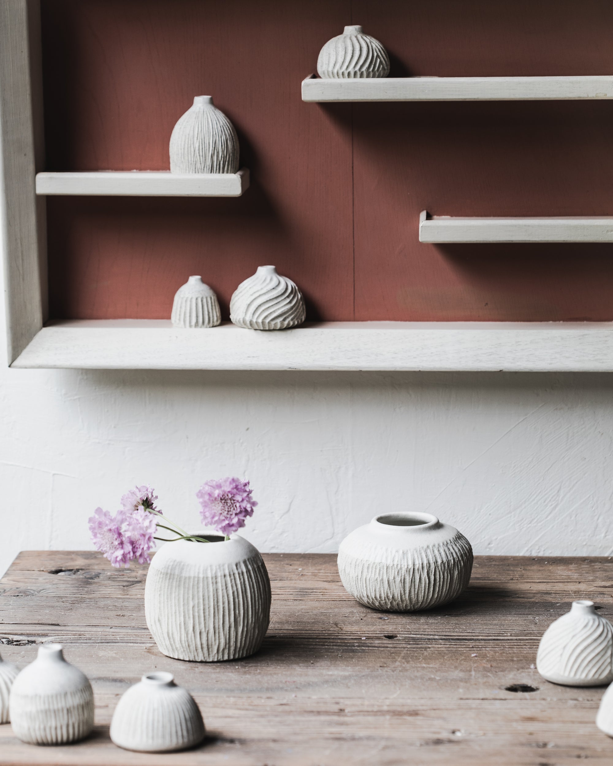 Wheelthrown and handcarved rustic white vases by clay beehive ceramics