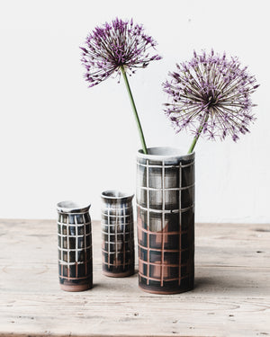 Carved tartan lined patterned slender tall vases handmade by clay beehive ceramics