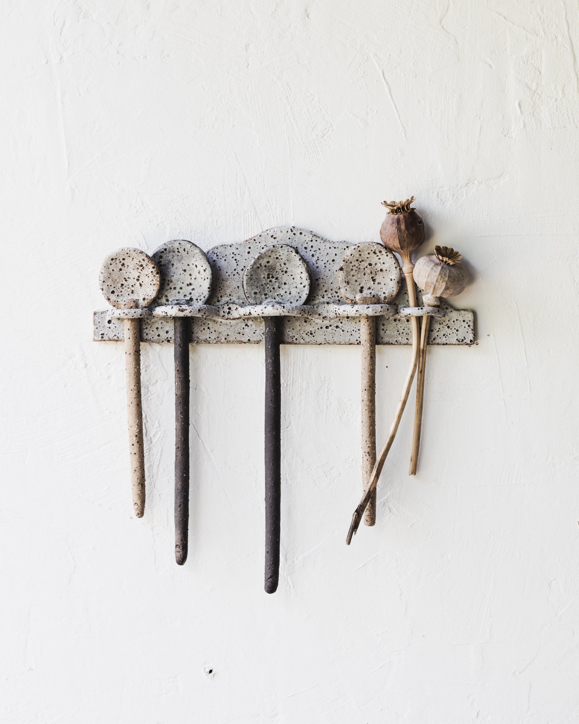 Rustic speckled wall hanger to hold spoons handmade and designed by clay beehive ceramics