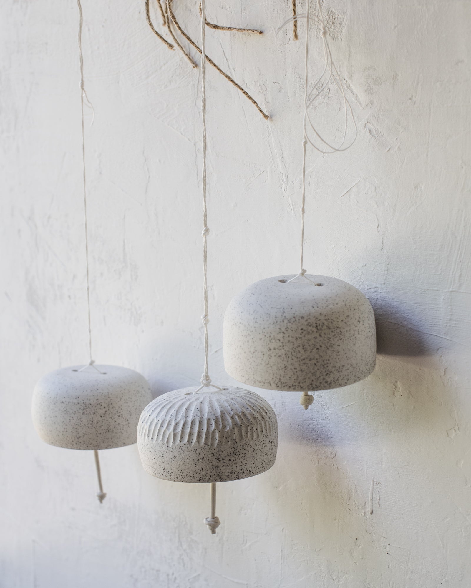 Speckled white decorative bells with a gorgeous ringing sound (Group Four)