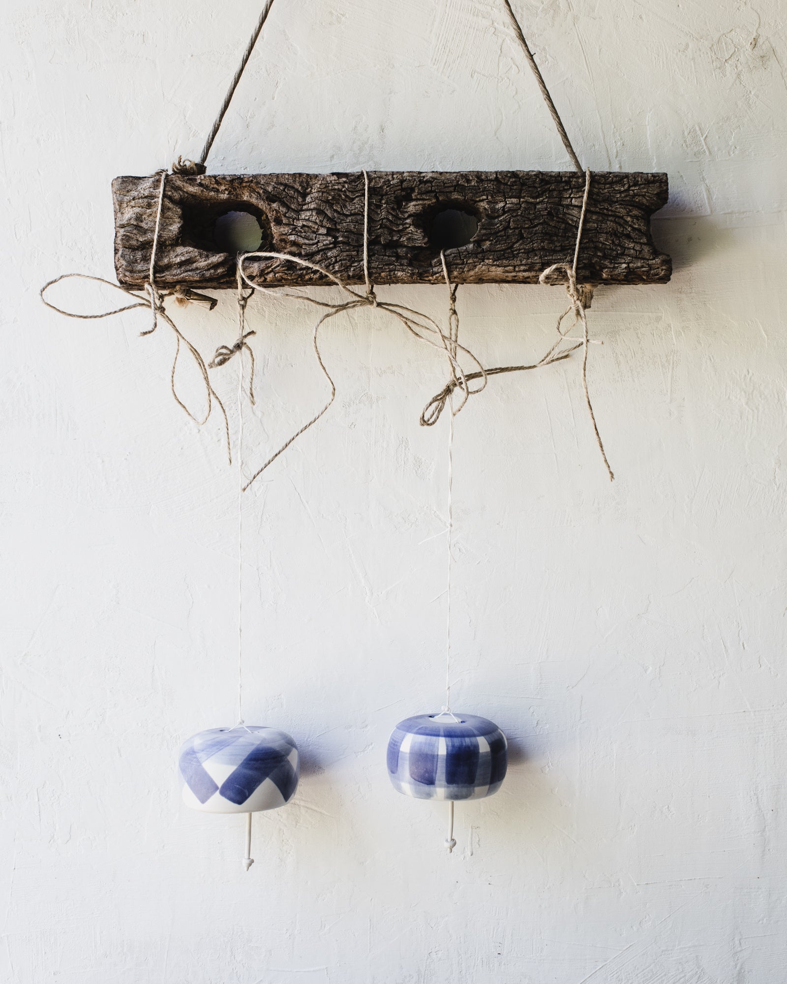 Beautiful ringing blue and white handmade ceramic bells by clay beehive