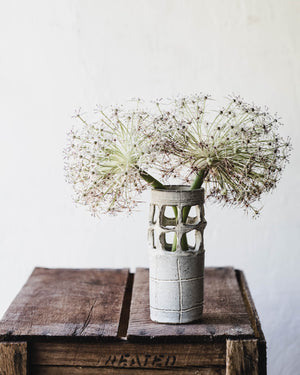 quirky cutout handmade vase in soft grey and white by clay beehive ceramics