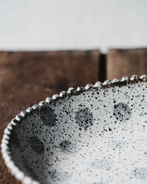 Rustic scallop rim bowl with grey polka dot handmade by clay beehive ceramics