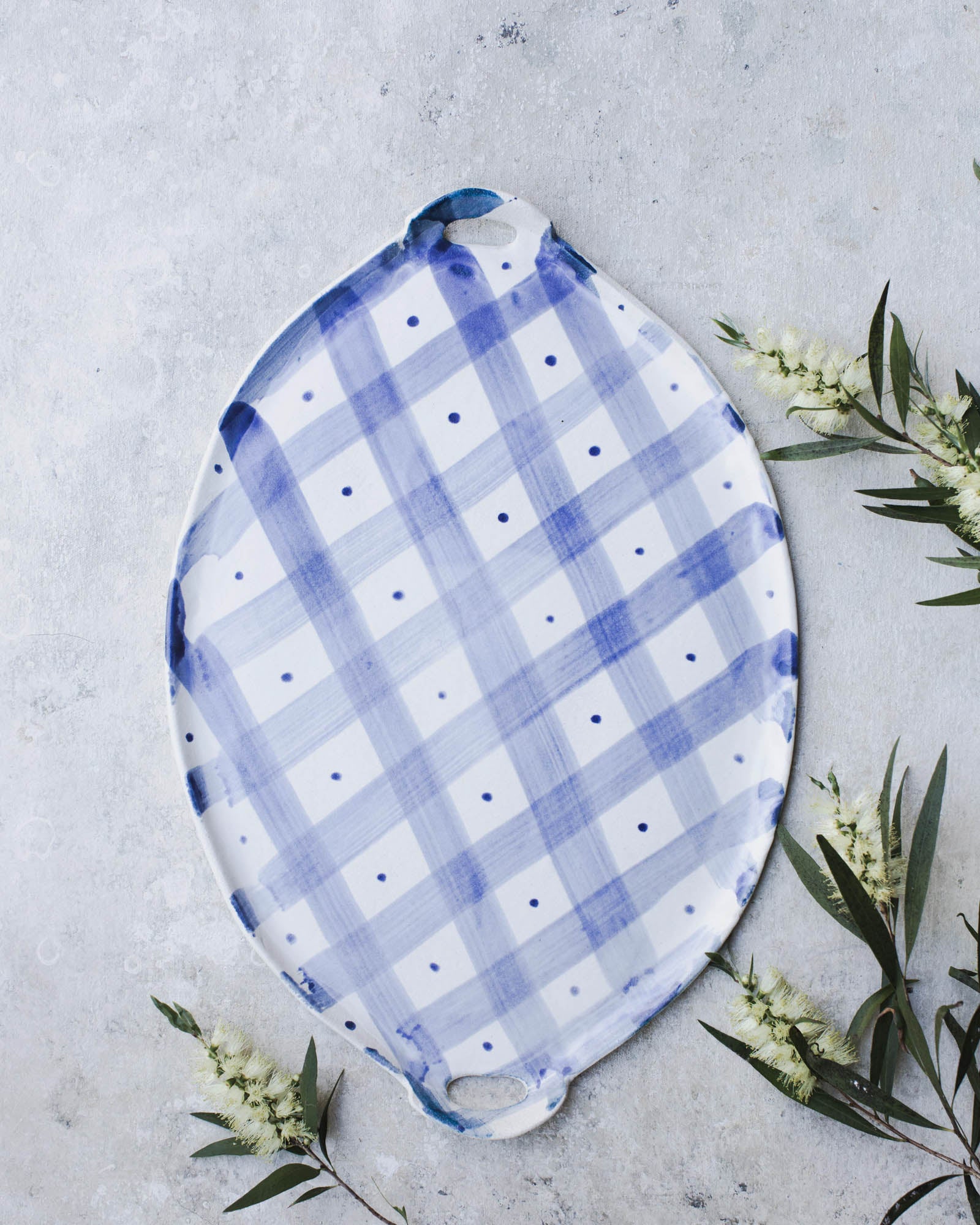 Blue and white diamond plaid patterned platter by clay beehive ceramics