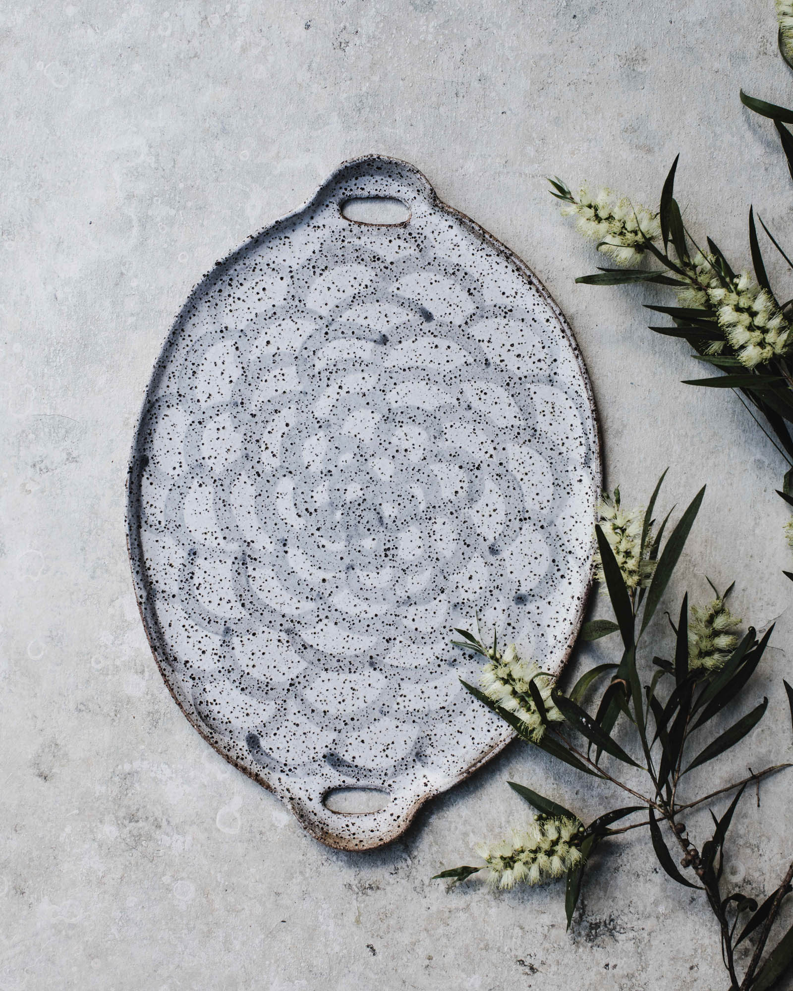 rustic speckled platter with cut out handles by clay beehive ceramics