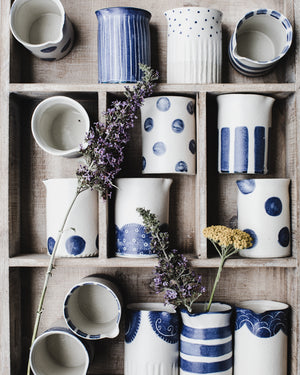 Little blue and white farmhouse jugs hand made by clay beehive ceramics
