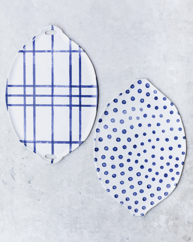 blue and white patterned platters handmade by clay beehive ceramics