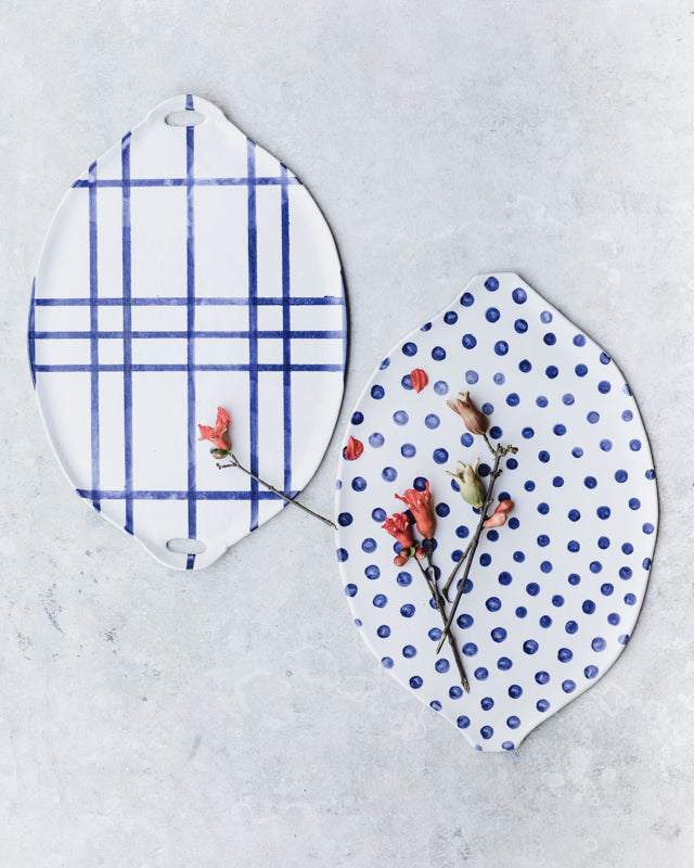 blue and white patterned platters handmade by clay beehive ceramics
