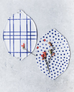blue and white patterned platters handmade by clay beehive ceramics