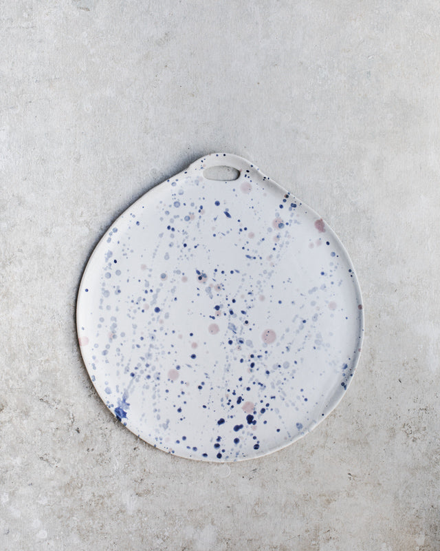 Ceramic handmade platter with drippy splash glazing by clay beehive