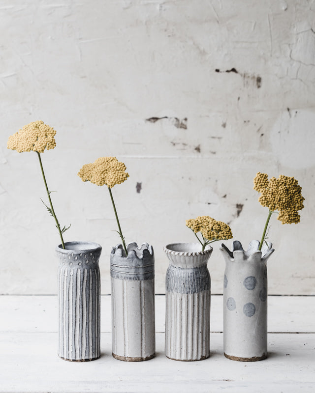 Rustic vases in grey and white with carvings and fluting by clay beehive ceramics