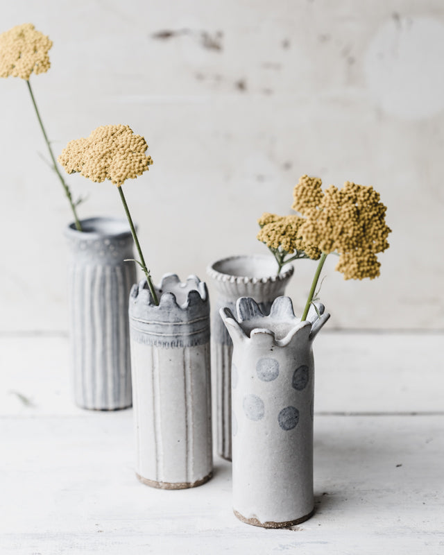 Rustic vases in grey and white with carvings and fluting by clay beehive ceramics