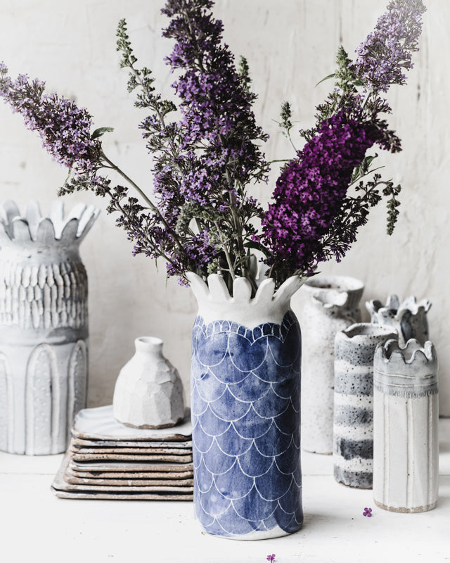 a large sculptural blue and white sgraffito vase with scallop rim by clay beehive ceramics
