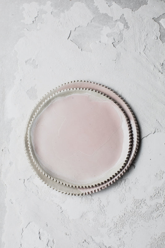 Pretty ceramic pink plates by clay beehive