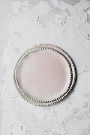 Pretty ceramic pink plates by clay beehive
