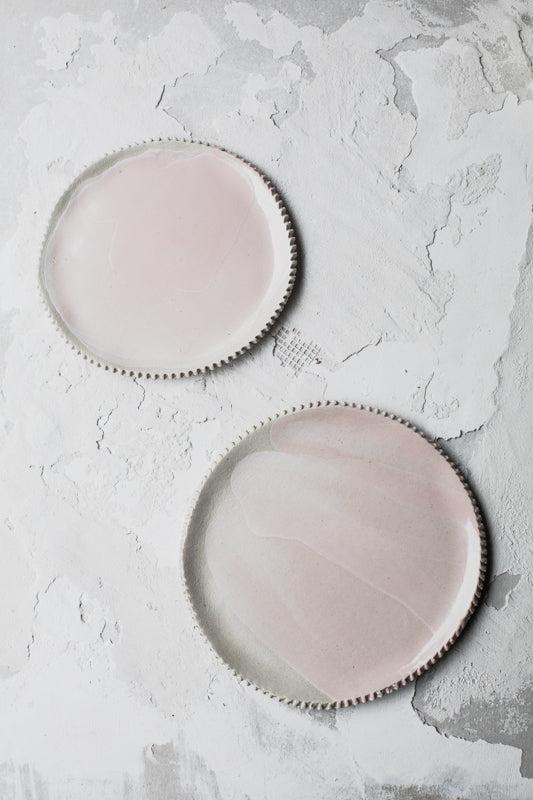 Pretty ceramic pink plates by clay beehive