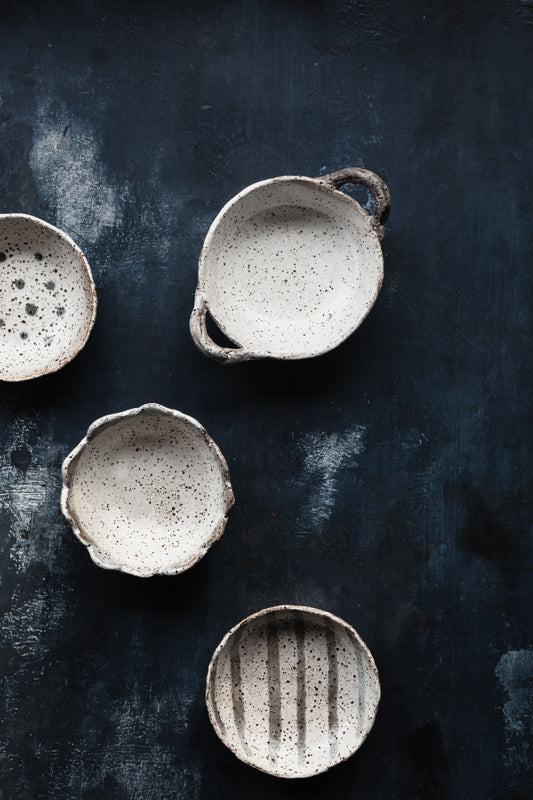 rustic gritty bowls with detailed edge by clay beehive
