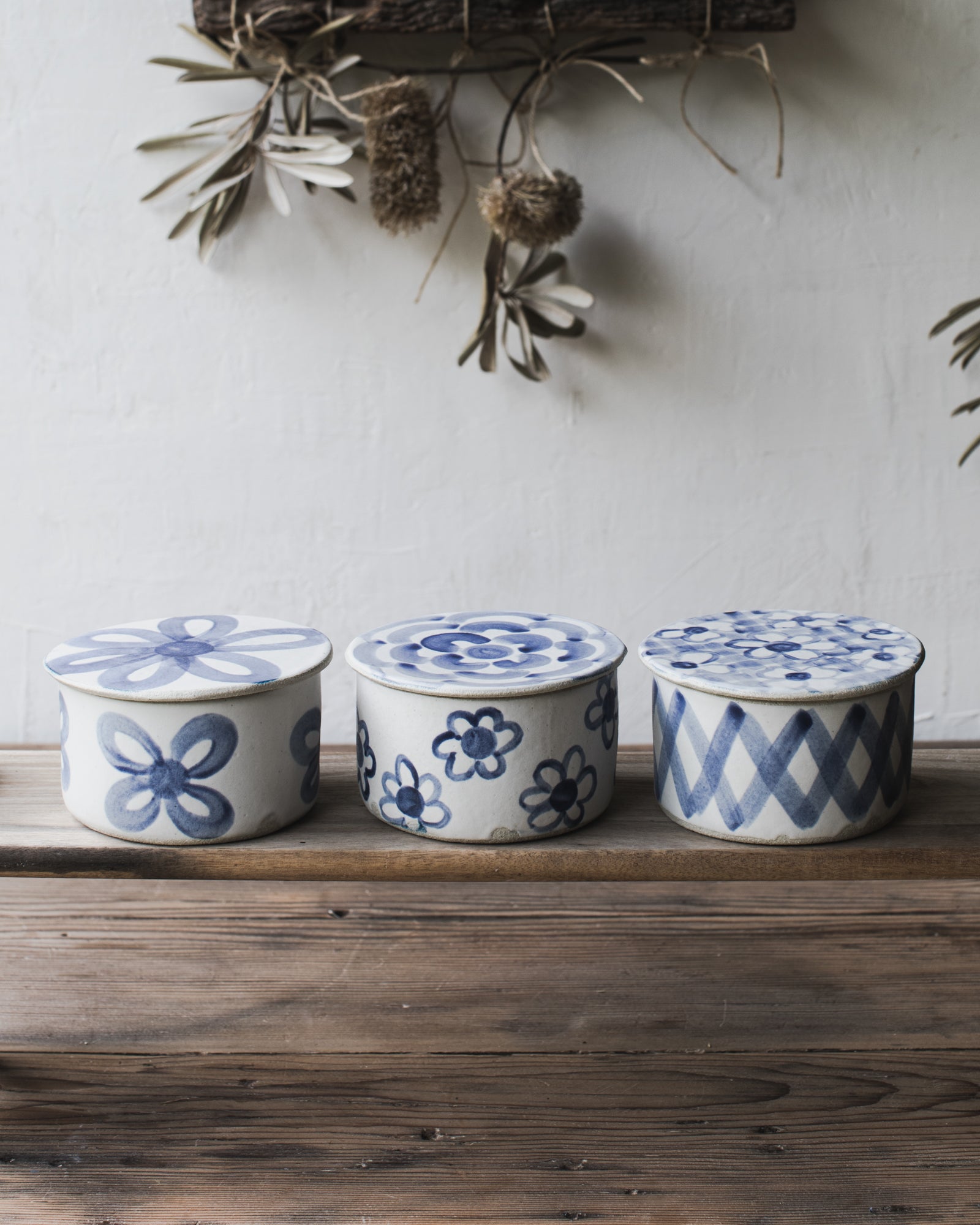 French style butter bell with blue and white patterns by clay beehive ceramics